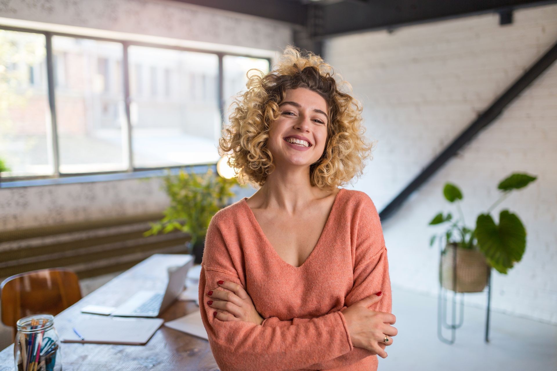 Portrait of confident creative businesswoman in office